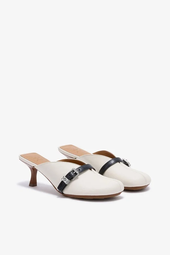 Sue Heeled Mules in white Sue Heeled Mules in white