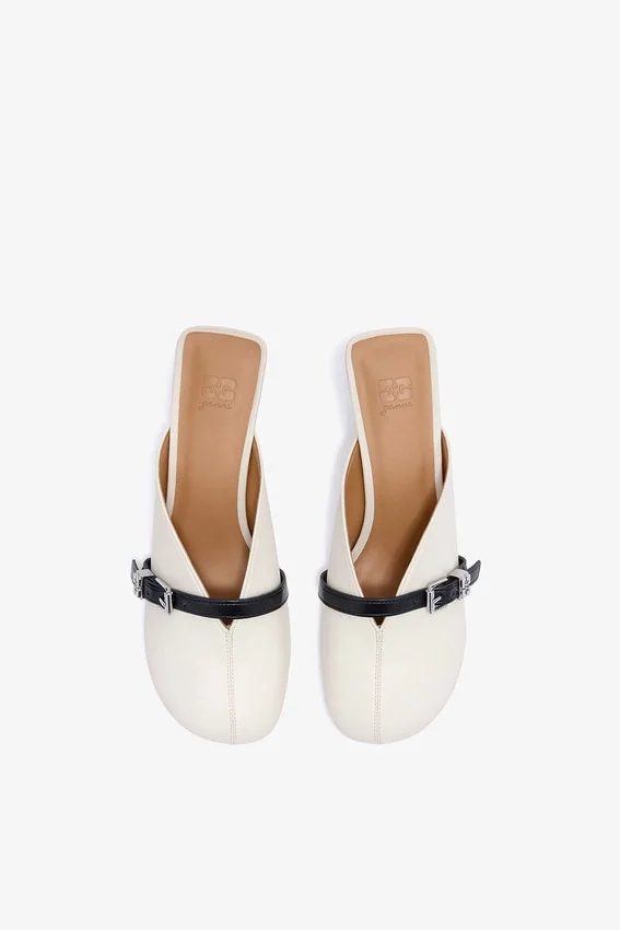 Sue Heeled Mules in white Sue Heeled Mules in white
